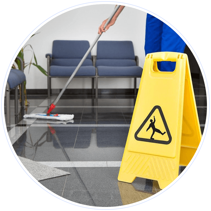 A person mopping the floor with a wet mop.